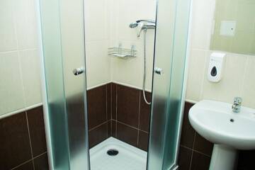 Фото номера Улучшенный двухместный номер с 2 отдельными кроватями Отель Гостиница ГОЦОР по игровым видам спорта г. Гомель 9